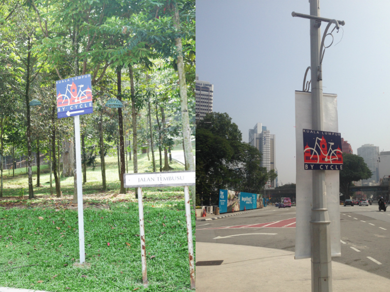 KL By Cycle signs in the garden