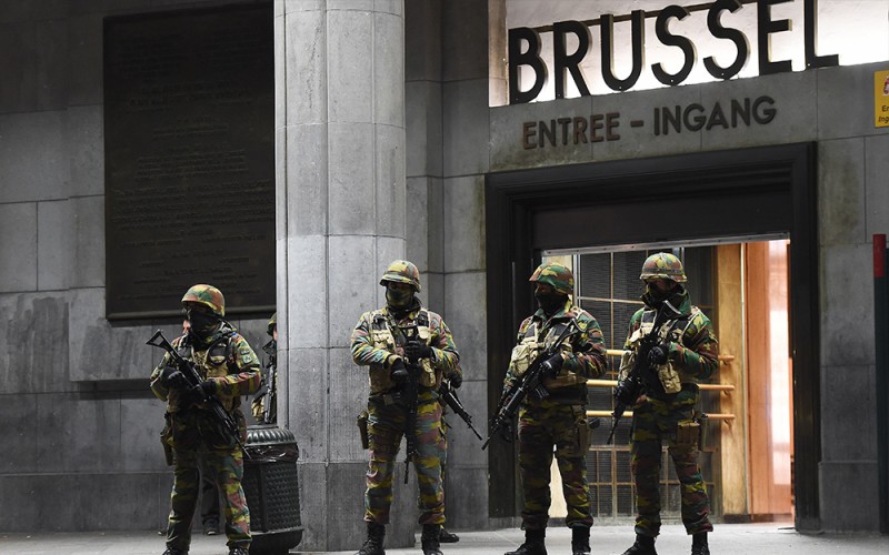 Soldiers stand guard in front of the central train station on Nov. 22, 2015, in Brussels, as the Belgian capital remained on the highest security alert level over fears of a Paris-style attack. (Emmanuel Dunand/AFP Photo) 