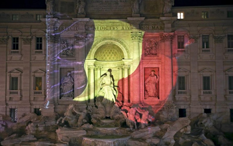 The black, yellow, and red colours of the Belgian flag are projected on the Trevi fountain in Rome, Italy. (Pic credit: Stefano Rellandini/REUTERS) 