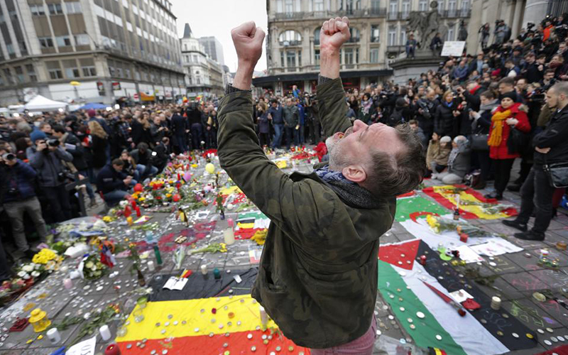 A man reacts at a street memorial following the bomb attacks in Brussels. (Pic credit: Vincent Kessler/REUTERS) 