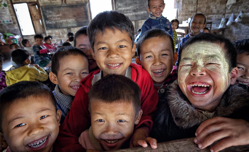 A group of happy boys in a primary school in Hsipaw, Myanmar (Photo credit: Dietmar Temps/Flickr) 