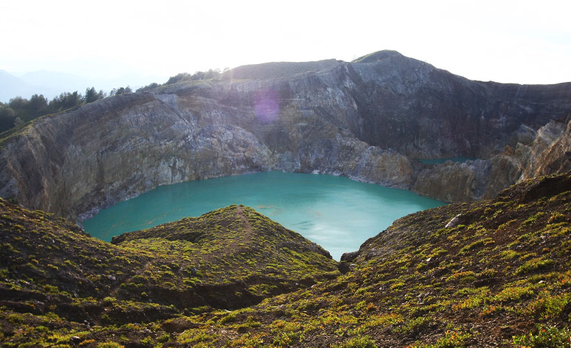 Pick up a non-touristy destination such as Flores Island, Indonesia for your break this year.