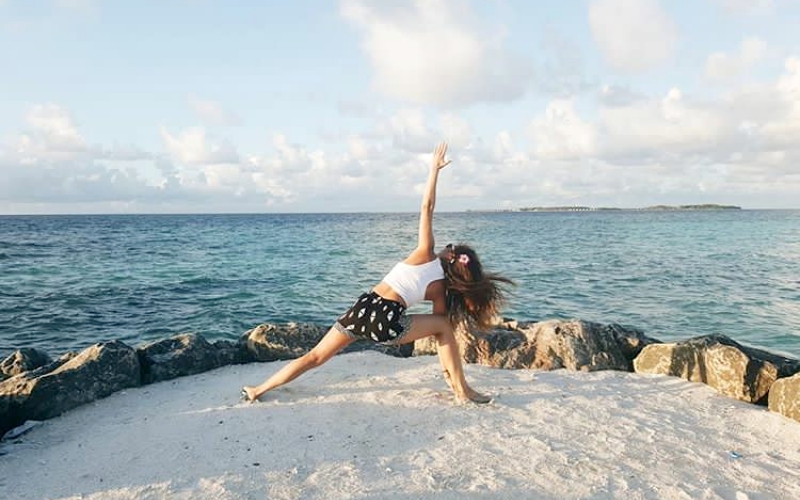 Yoga with a view at Maafushi Islands, Maldives (Photo credit: Instagram @natashaloo)