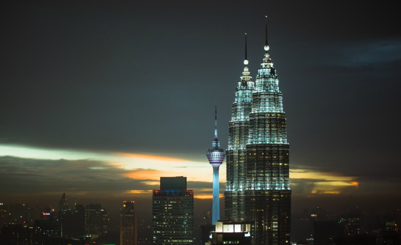 The Twin Towers at Dusk (Photo Credit: Flickr / Naz Amir)