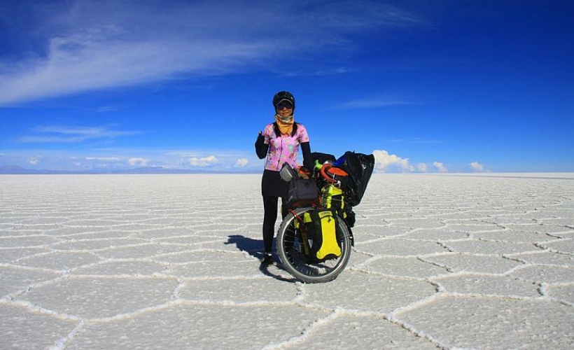 Hyo Jin Jeong's solo bike trip around the wrld started seven years ago (Photo Credit: UniverseWithMe.Com)