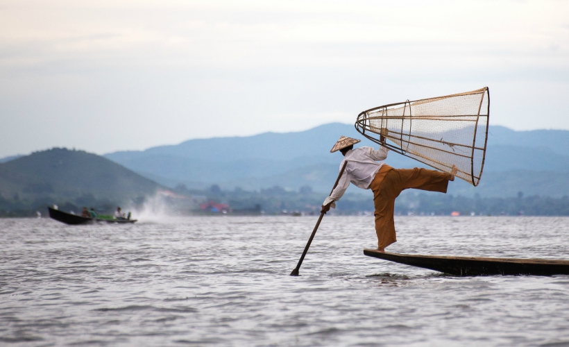 A traditional fisherman on Inle Lake, Myanmar (Photo Credit: Flickr / Alex Berger)
