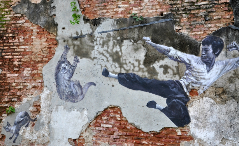 A close up of the comic Bruce Lee wall mural  in George Town. (Photo Credit: Flickr / Shankar S.)