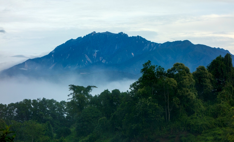 Mount inabalu is the highest peak in Borneo's Crocker Range and is the highest mountain in Malaysia.