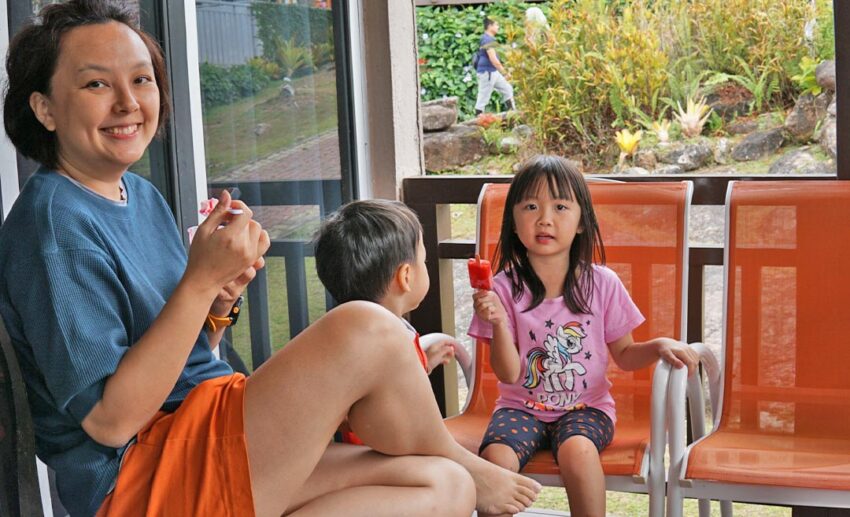 Enjoying strawberry ice cream.