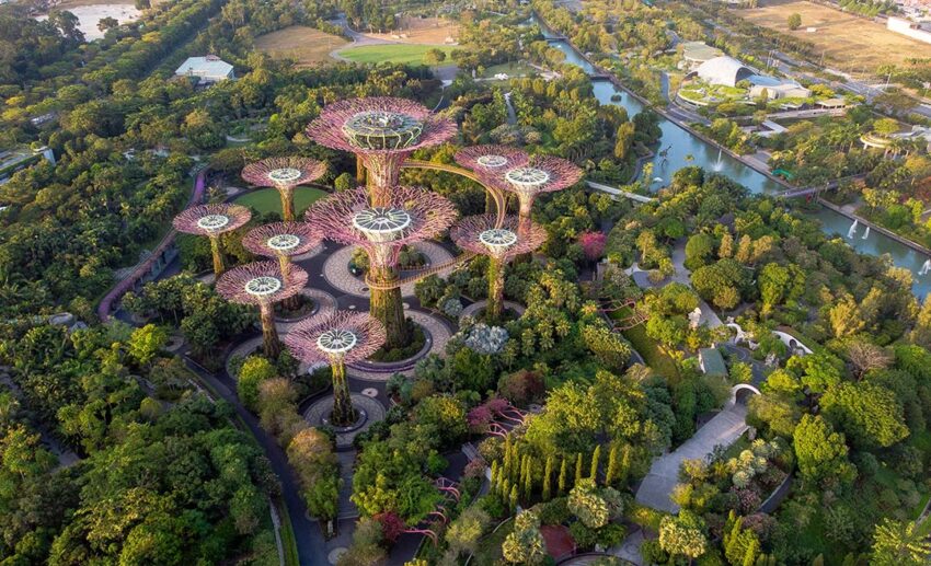 Aerial view of the Supertree Grove at Gardens by the Bay in Singapore, a primary gateway for the Emirates multi-city flight pass.