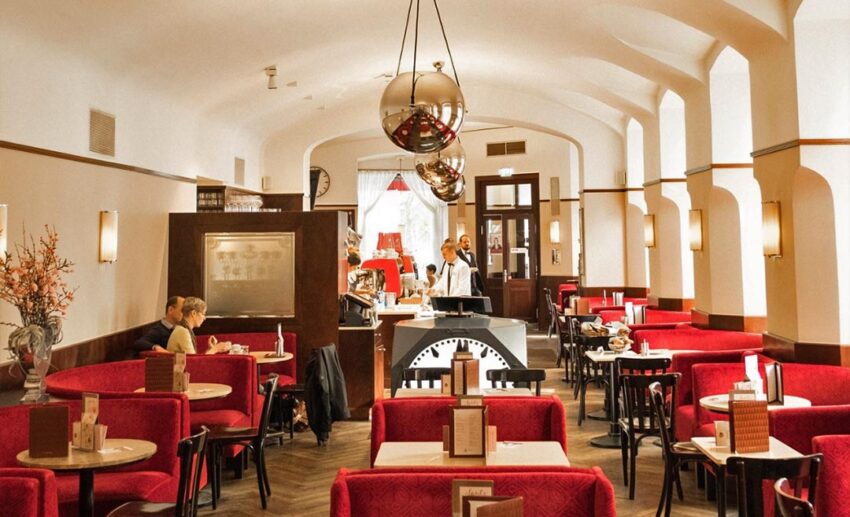 The minimalist, historic interior design of Café Museum, once a haunt for Vienna's famous painters and architects.