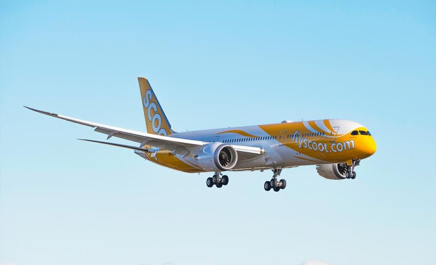 A Scoot Boeing 787-8 Dreamliner in flight, offering budget-friendly travel connections from Singapore to Vienna.