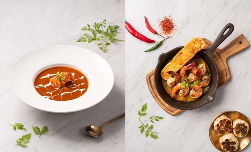 A rich lobster bisque and a plate of garlic-infused prawn gambas served at JIN Gastrobar.