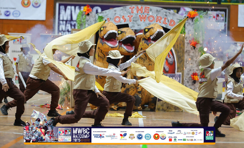 A vibrant marching band performance (Pancaragam) at Dataran Merdeka as part of the KL Festival 2026 family-friendly programming.