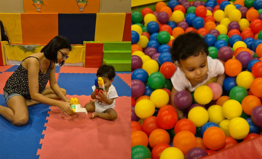 (Left) Danisha Nair sitting on a padded mat building blocks with her son; (Right) A candid shot of the baby boy smiling in a colourful plastic ball pit.