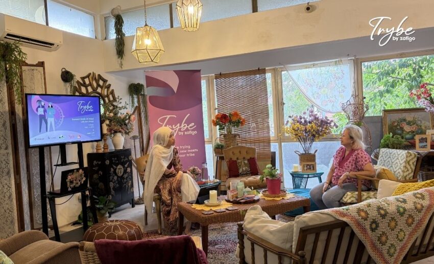 Marina Mahathir and Aida Ihsani seated together in casual conversation before the start of the Trybe by Zafigo: Summit State of Mind event at Aida's Loft.