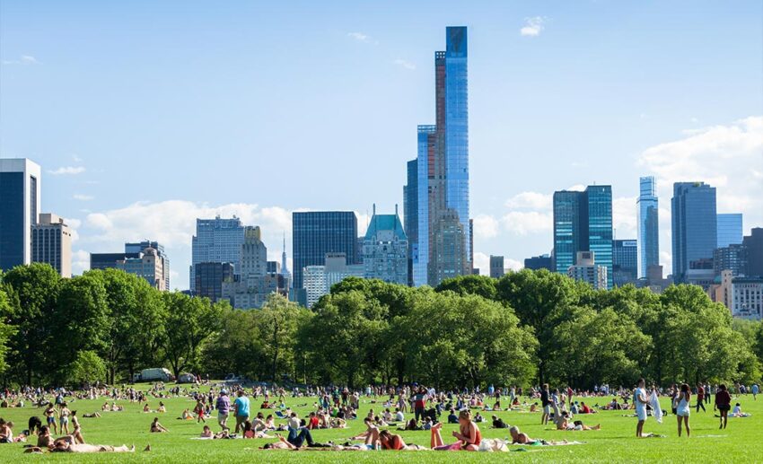 People relaxing, walking, and spending leisure time together in Central Park, New York