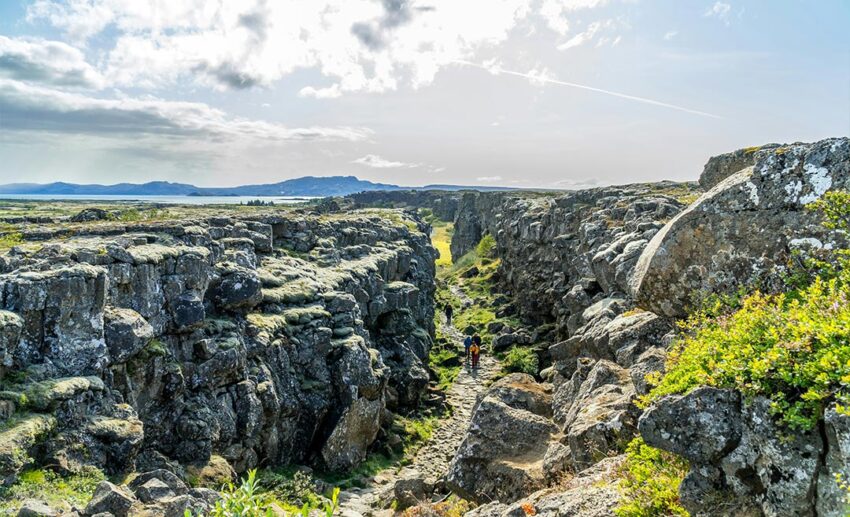 Rocky mountain landscape and walking path in Thingvellir, Iceland.