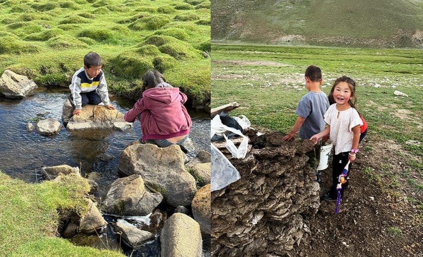 Local Mongolian nomadic children playing in a clear stream and on grassy riverbanks across the Gobi plain.