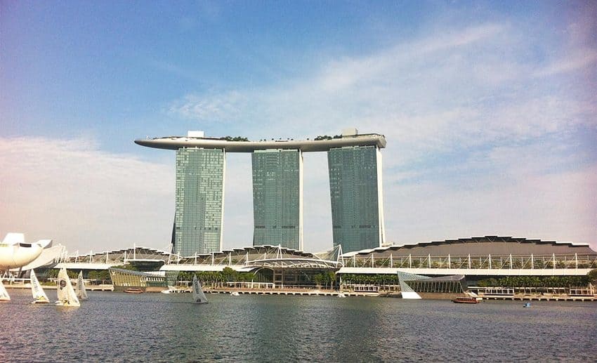 Architecture shot of the Marina Bay Sands building viewed from street level during Jessica Holmes's trip to Singapore.