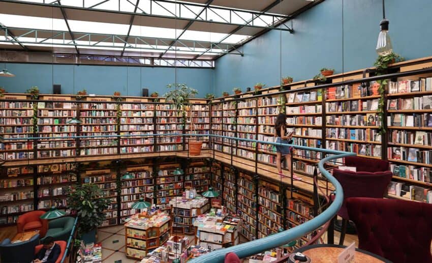 The towering wooden bookshelves and vibrant reading spaces inside the Biblioteca Vasconcelos in Mexico City.